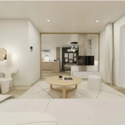 Jasne wnętrze salonu z widokiem na kuchnię i jadalnię, okrągły stolik kawowy na wzorzystym dywanie, designerski fotel i lampa na ścianie, duże okno z widokiem na zachód słońca.