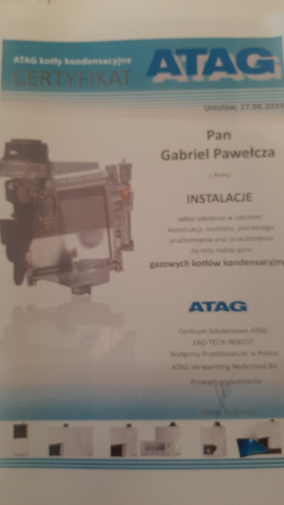 Skan certyfikatu szkoleniowego ATAG dla Pana Gabriela Pawełczyka z zakresu konstrukcji, montażu i uruchomienia gazowych kotłów kondensacyjnych, z ilustracją kotła i logotypami ATAG.