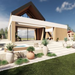 Zielona Posesja - Nowoczesny dom z ogrodem: minimalistyczna architektura, taras z jacuzzi, rośliny w donicach, trawnik. Ujęcie w słoneczny dzień.