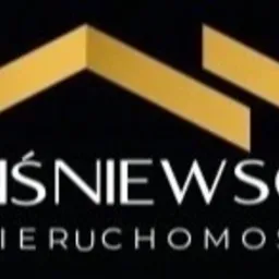 Logo firmy Wiśniewscy Nieruchomości z abstrakcyjnym symbolem dachu w kolorze złotym na czarnym tle.