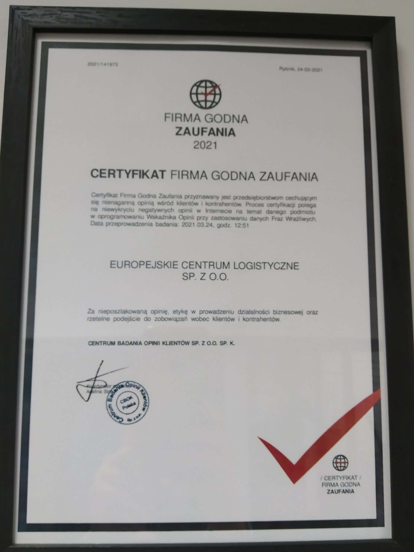Oprawiony w ramkę certyfikat 'Firma Godna Zaufania 2021' Europejskiego Centrum Logistycznego, z pieczęcią i datą Rybnik, 24-03-2021.
