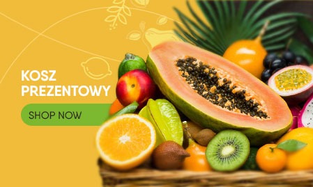 Kompozycja egzotycznych owoców: papaya, kiwi, karambola, pomarańcze i inne, ułożonych w wiklinowym koszu, z żółtym tłem i napisem 'Kosz prezentowy' oraz przyciskiem 'Shop Now'.