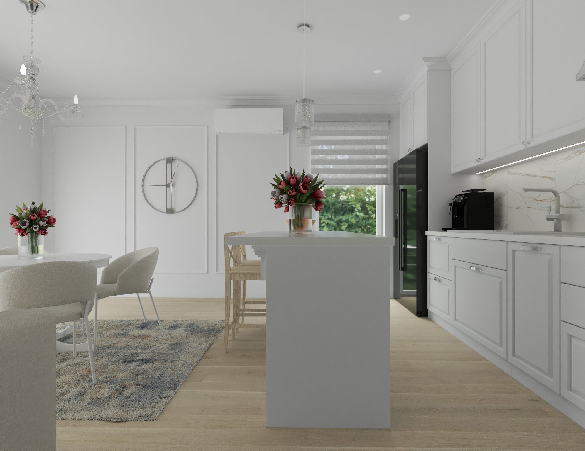 Jasne, nowoczesne wnętrze: biała kuchnia z wyspą, drewniane blaty barowe, okrągły stół z bukietem tulipanów i dywanem w odcieniach szarości, całość doświetlona żyrandolem.