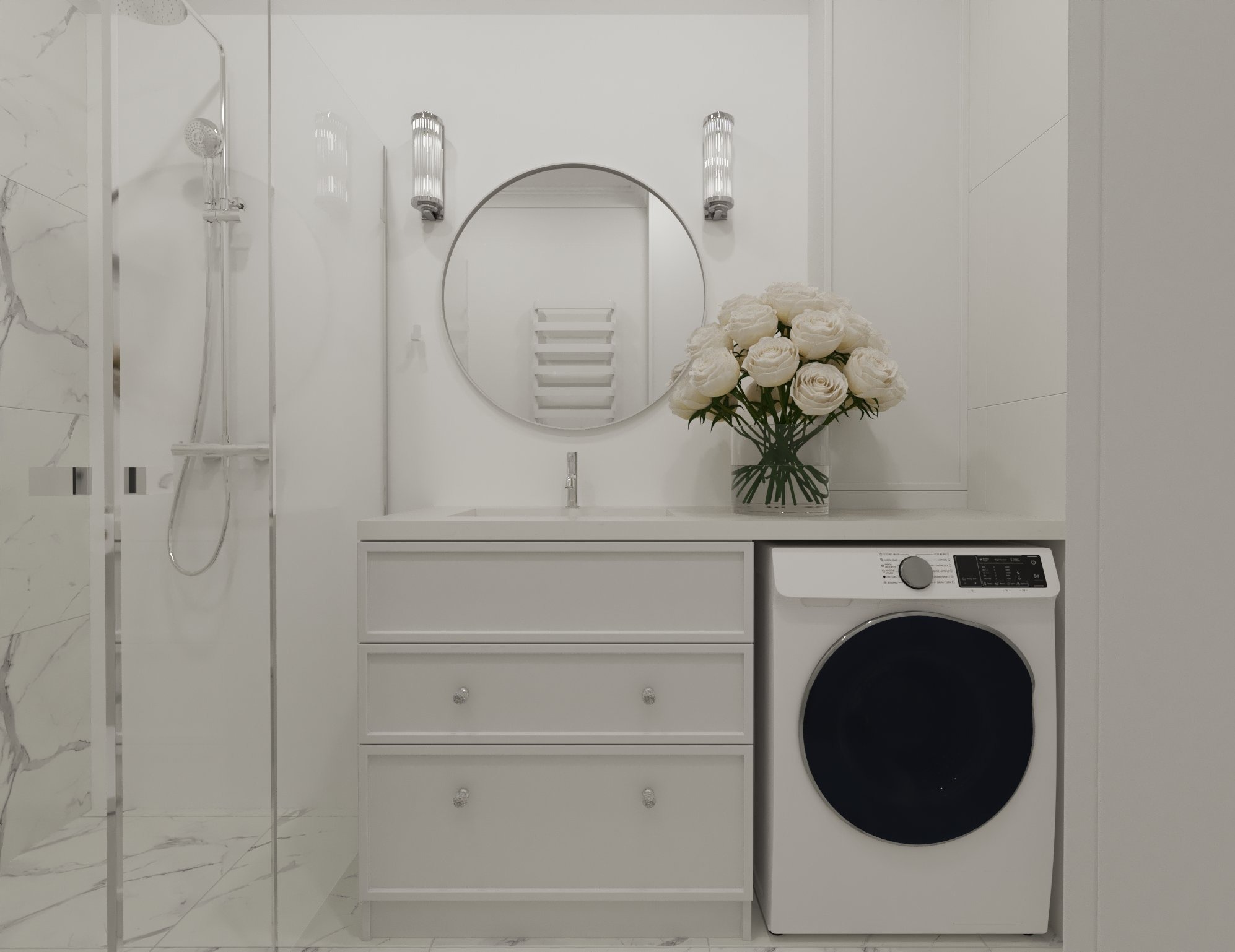 Elegancka, minimalistyczna łazienka w odcieniach bieli z marmurowym akcentem na ścianie prysznica, okrągłe lustro nad umywalką z szafką z trzema szufladami, pralka w zabudowie i bukiet białych róż.