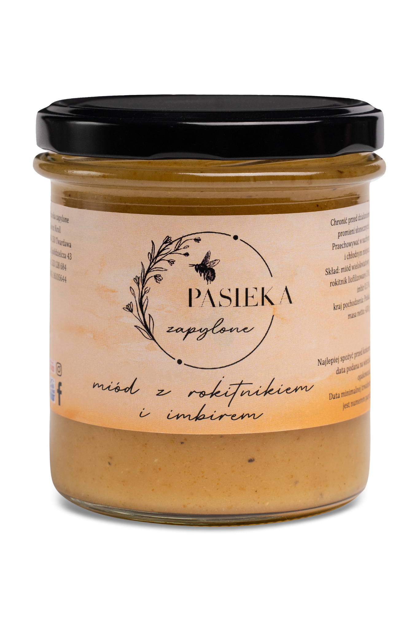 Słoik miodu z rokitnikiem i imbirem, etykieta z motywem pszczoły i napisem 'Pasieka zapylone', czarna zakrętka, widoczne drobinki rokitnika w miodzie.