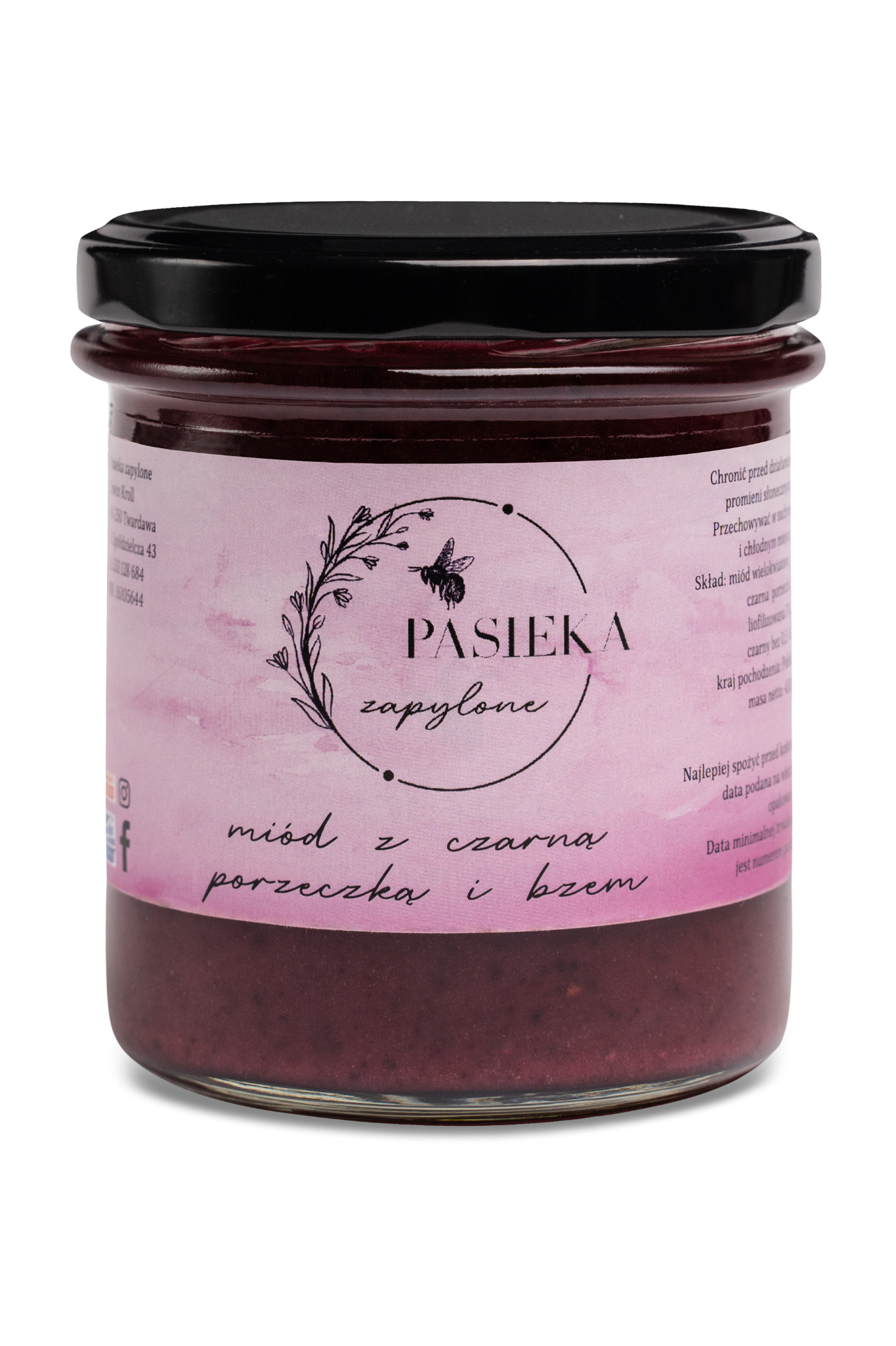 Słoik ciemnego miodu z czarną porzeczką i bzem, z etykietą 'Pasieka Zapylone' i grafiką pszczoły w wieńcu z gałązek.