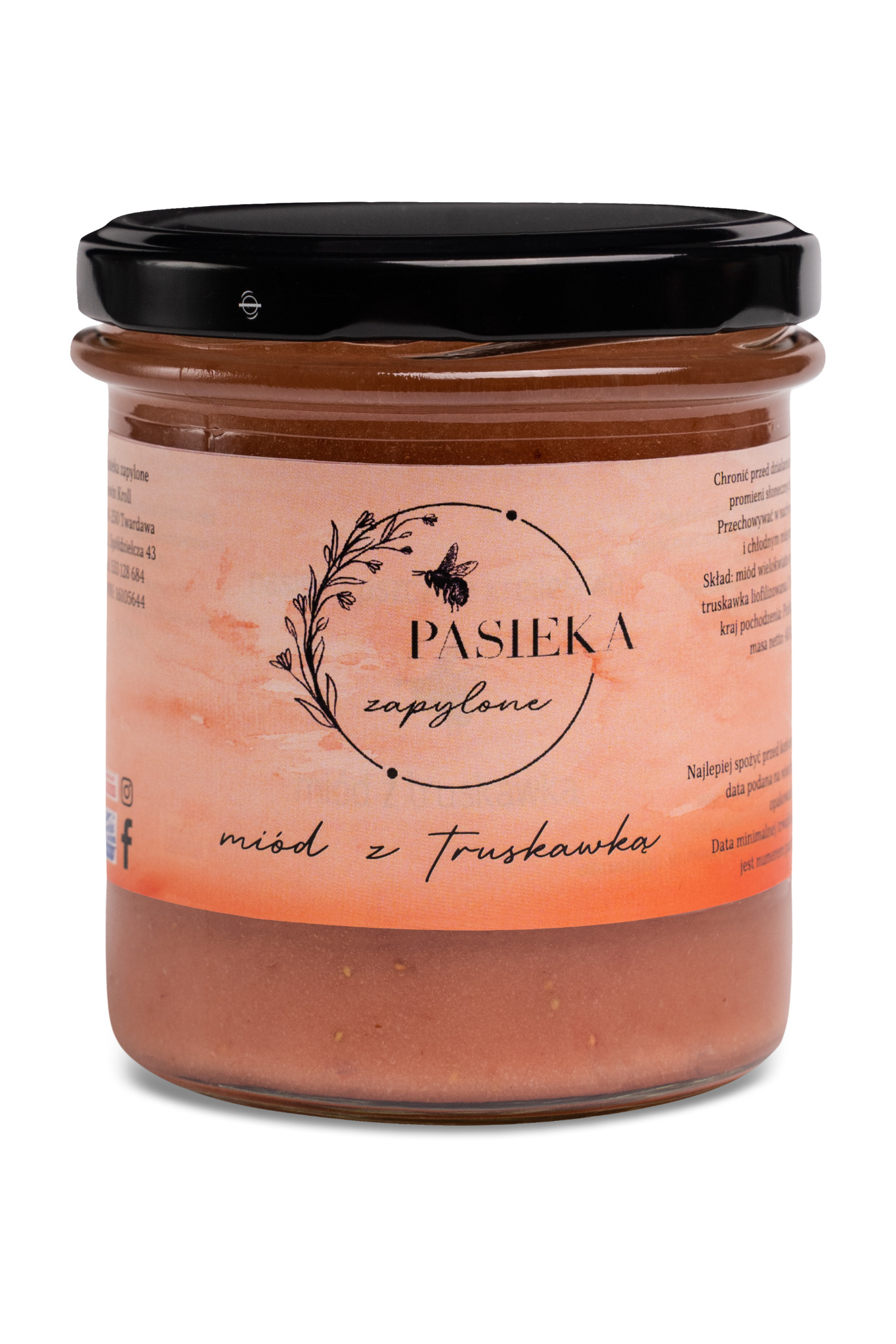 Słoik miodu z truskawką od Pasieki Zapylone, z czarną zakrętką i etykietą w odcieniach pomarańczy z motywem pszczoły i kwiatów, na białym tle.