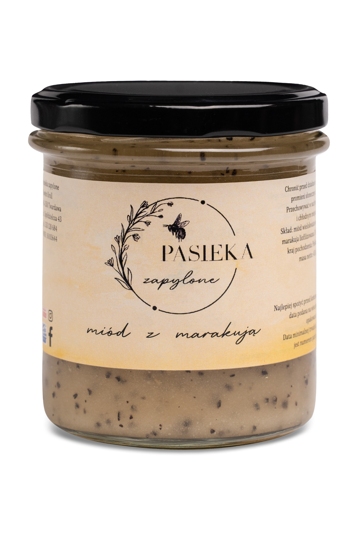 Słoik z miodem z marakują, etykieta z napisem 'Pasieka Zapylone', widoczne drobinki marakui w miodzie, czarna zakrętka.