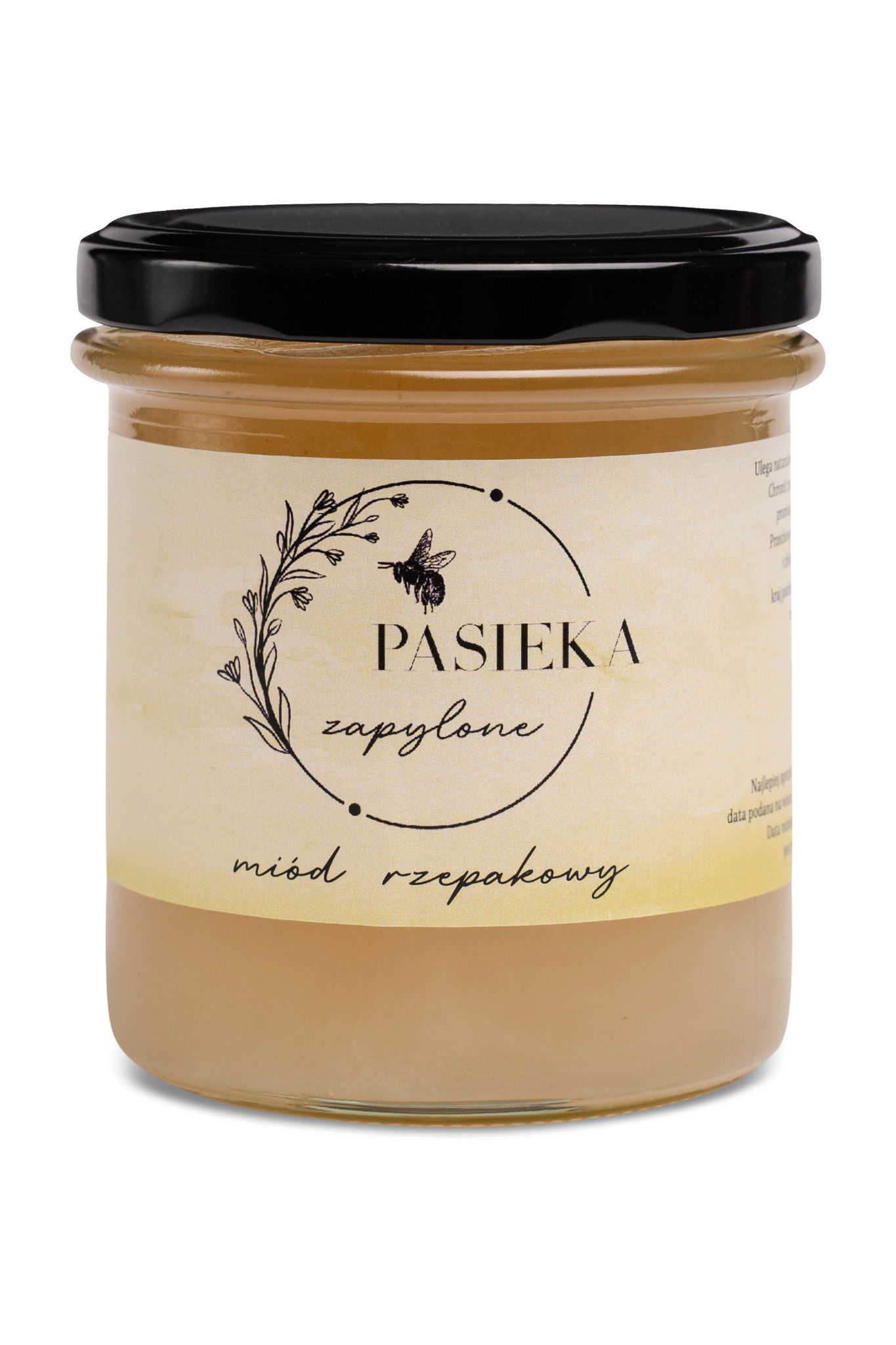 Słoik miodu rzepakowego z etykietą 'Pasieka Zapylone', czarne wieczko, na białym tle.