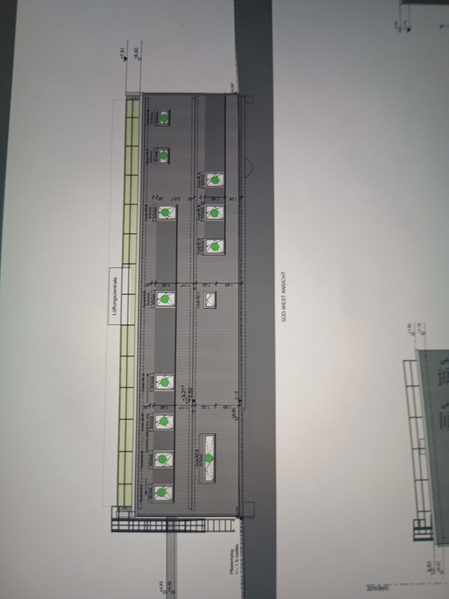 Rzut elewacji budynku z zaznaczonymi punktami wentylacyjnymi i opisami technicznymi, widok południowo-zachodni, z uwzględnieniem wymiarów i nazewnictwa elementów.