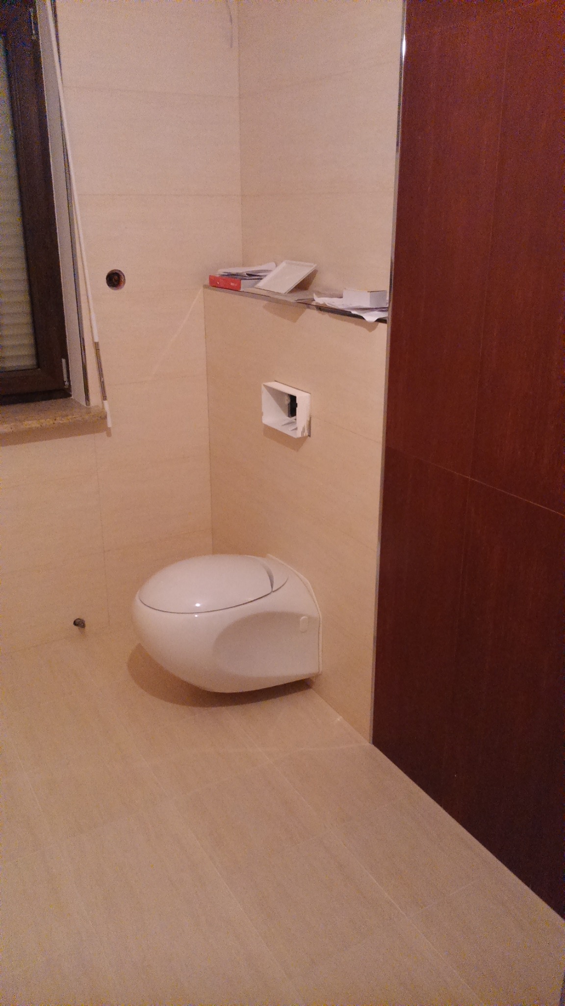 Wykonanie łazienki w płytkach oraz montaż armatury