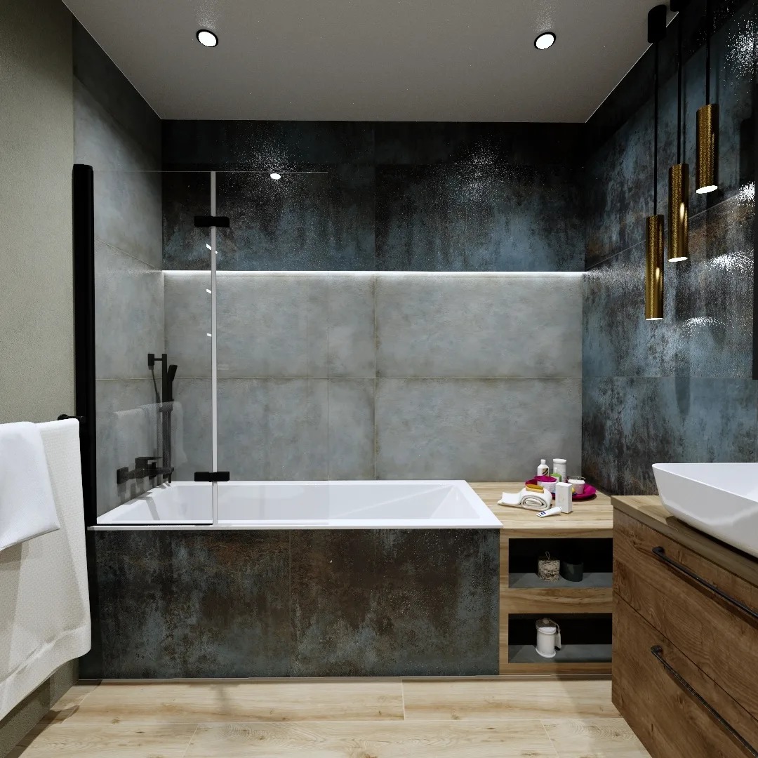 Nowoczesna łazienka z wanną obudowaną płytkami imitującymi rdzę, szklany parawan nawannowy, drewniana szafka pod umywalką i wiszące złote lampy.