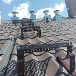 KPI Łukasz Sęczkowski - Montaż ław kominiarskich.