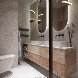 ASPEKT ARCHITEKTURA ANETTA SALA - Nowoczesna łazienka z podwójną umywalką nablatową, drewnianą szafką z szufladami i okrągłymi lustrami z podświetleniem LED, akcentowana wiszącymi lampami i dekoracyjnymi gałązkami w wazonie.