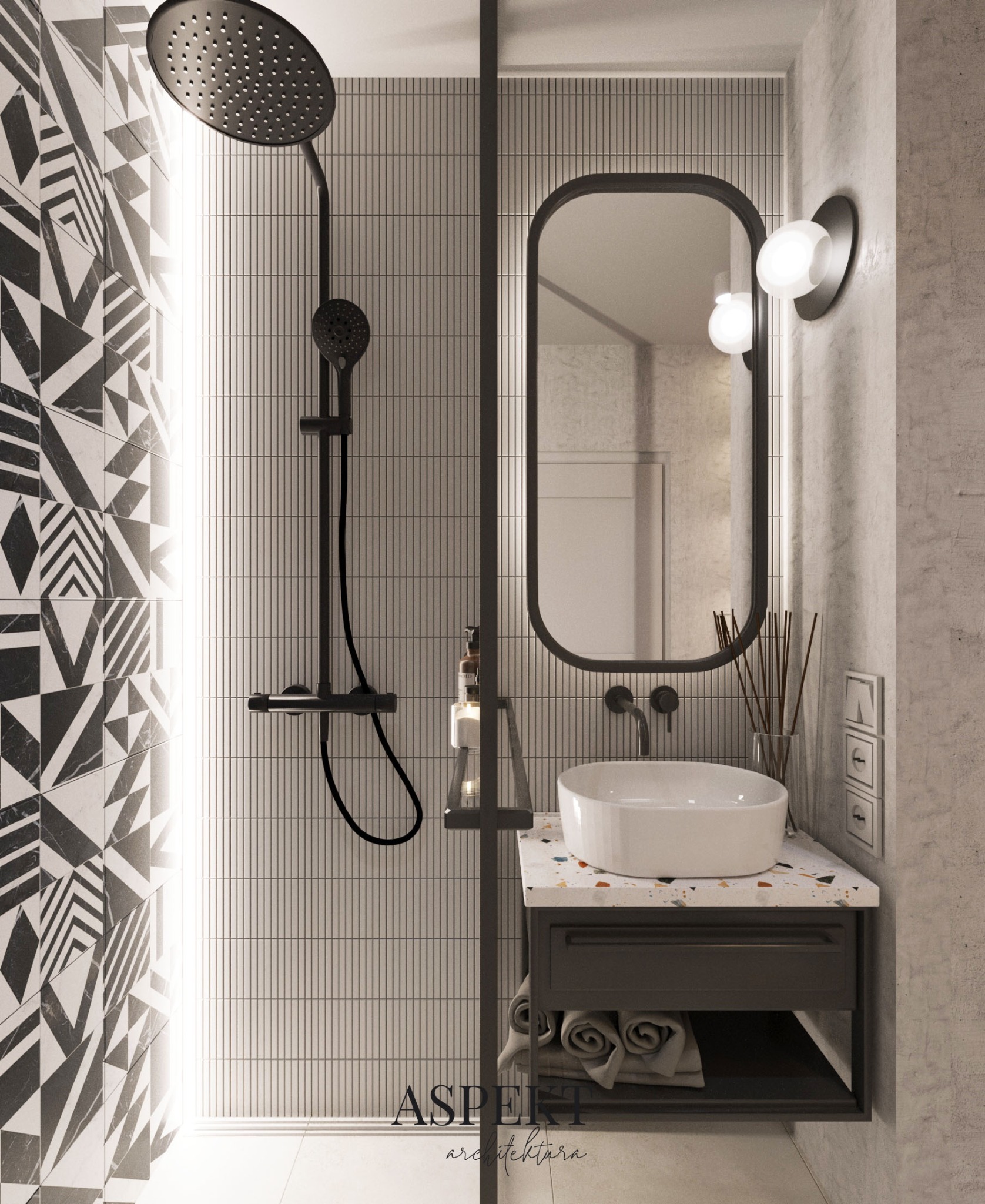 Nowoczesna łazienka z czarną armaturą, geometryczną mozaiką i umywalką nablatową na szafce z terazzo.