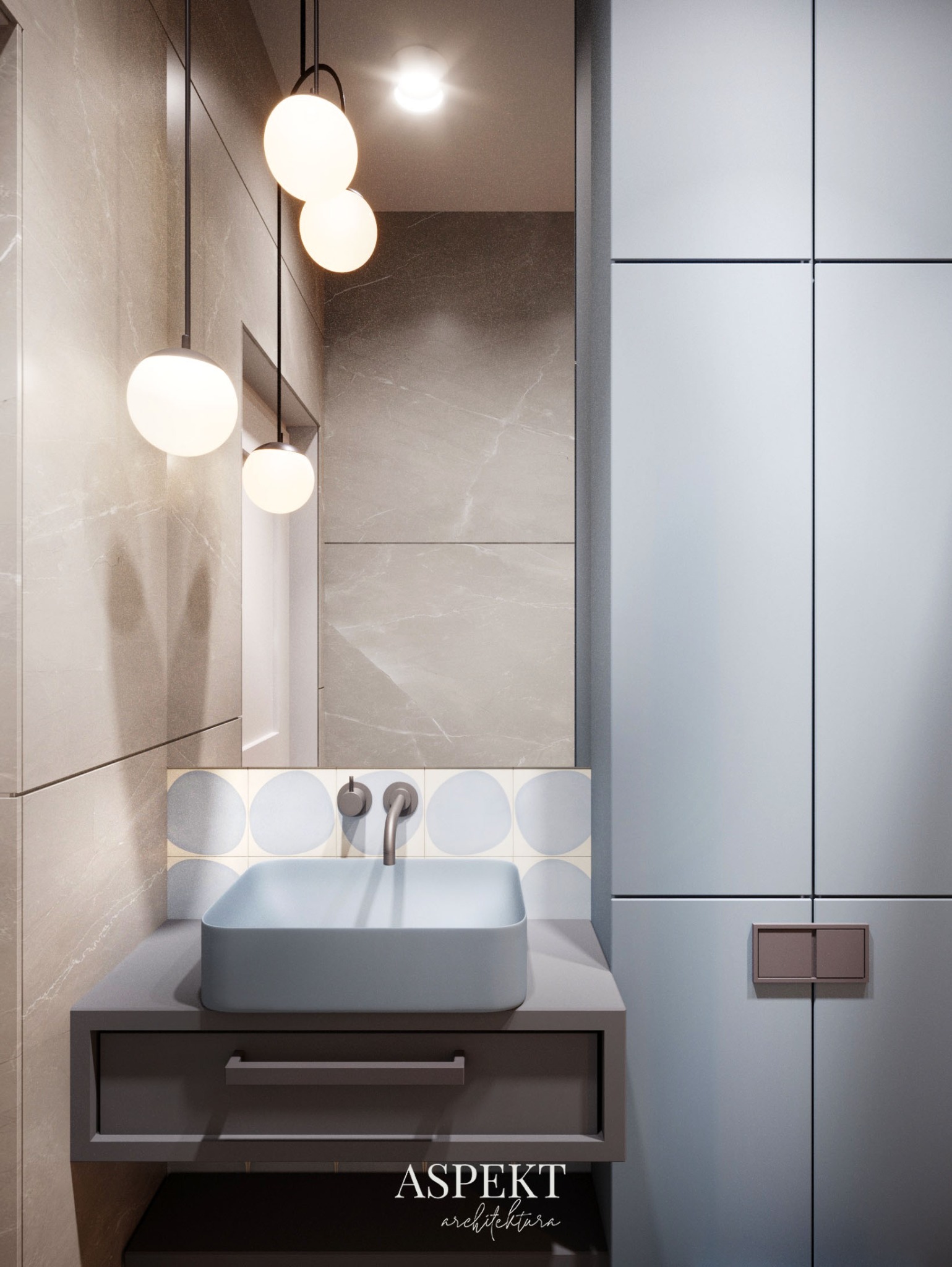 Nowoczesna łazienka z umywalką w kształcie kwadratu w kolorze pastelowego błękitu, okrągłymi płytkami w tle i minimalistycznymi lampami wiszącymi.