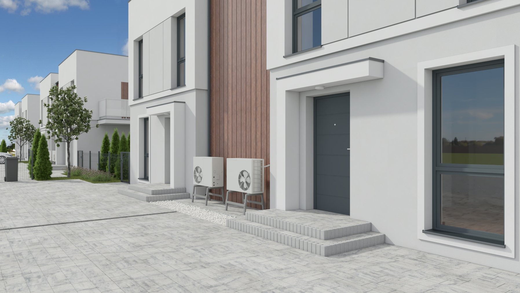 Nowoczesne, białe domy szeregowe ze stolarką okienną w kolorze antracytowym i klimatyzatorami na zewnątrz, Śrem.