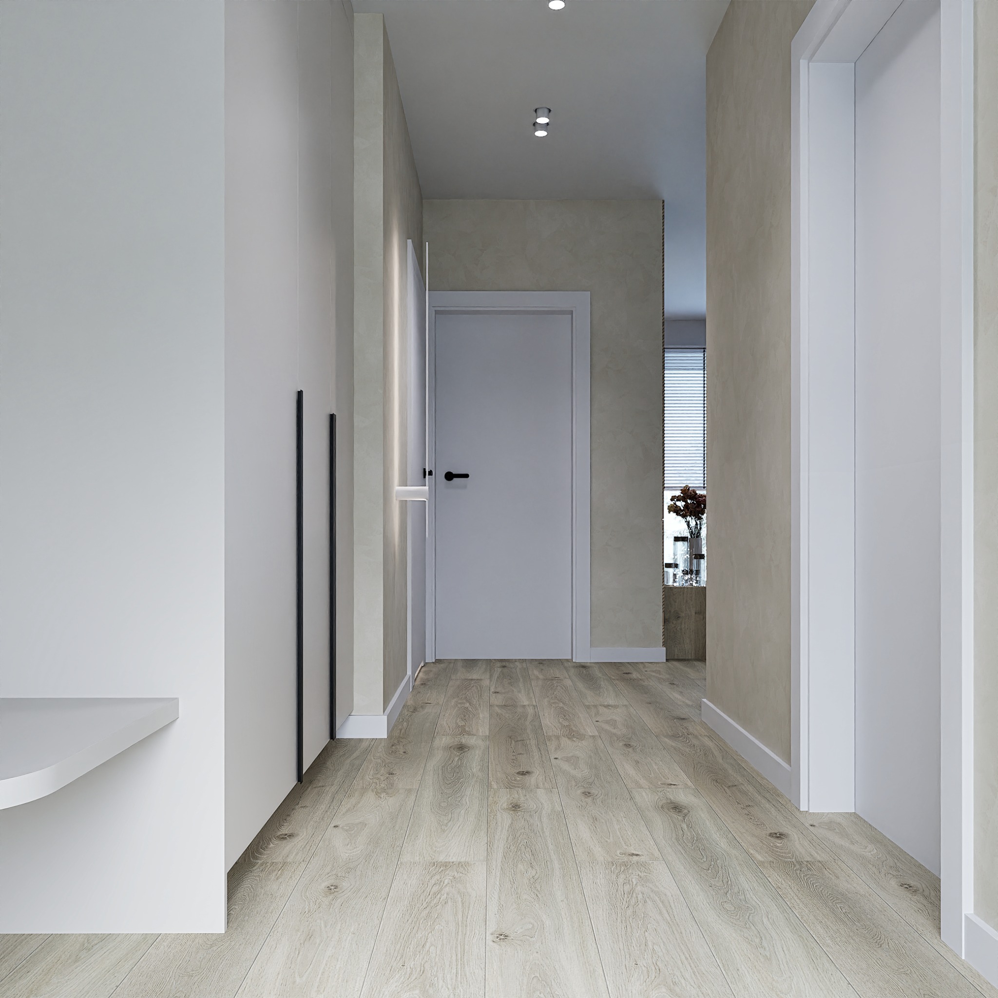 Nowoczesny korytarz z jasną podłogą, białą szafą z czarnymi uchwytami i białymi drzwiami. Minimalistyczny design, neutralna kolorystyka. Dwie lampy sufitowe.