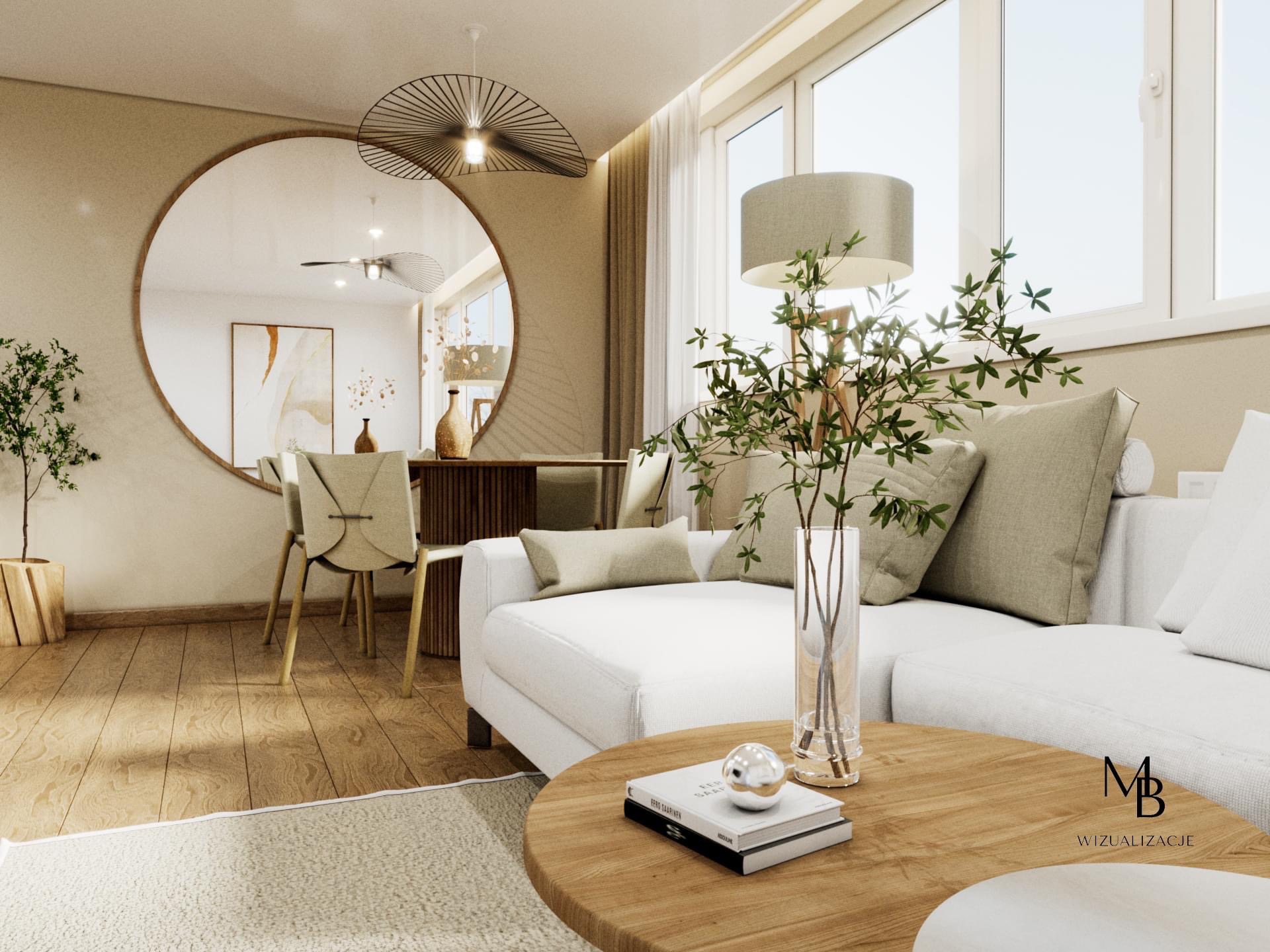 Wnętrze salonu z okrągłym lustrem, białym narożnikiem, drewnianym stolikiem kawowym i parkietem, oświetlone lampą z ażurowym kloszem, z widoczną rośliną w wazonie na stoliku i jadalnią w tle.