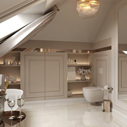 Załuczkowski Studio Interior Architecture - Luksusowa łazienka na poddaszu z oknem dachowym, szampanem w wiaderku z lodem i dwoma kieliszkami, eleganckim oświetleniem, beżową kolorystyką, toaletą i szafkami w zabudowie.