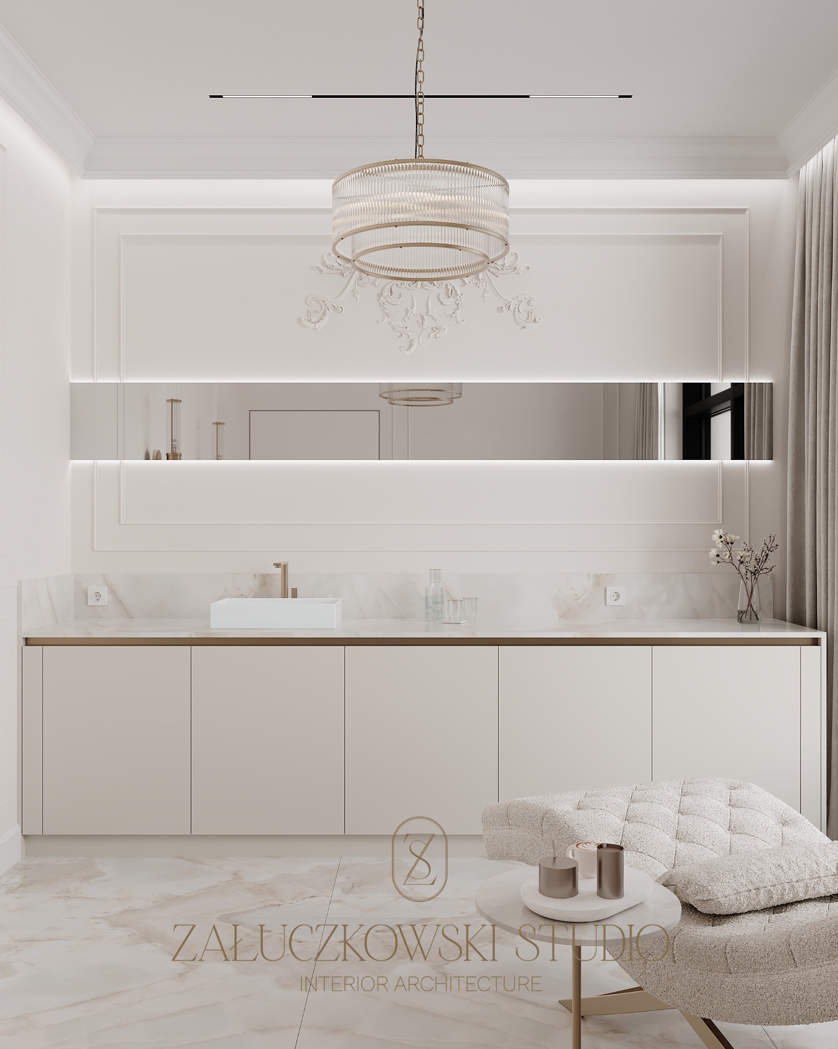 Elegancka łazienka w odcieniach beżu i bieli, z marmurową podłogą, szafką pod umywalką z białym blatem, lustrem z oświetleniem LED, ozdobnym żyrandolem, i fotelem z małym stolikiem kawowym.
