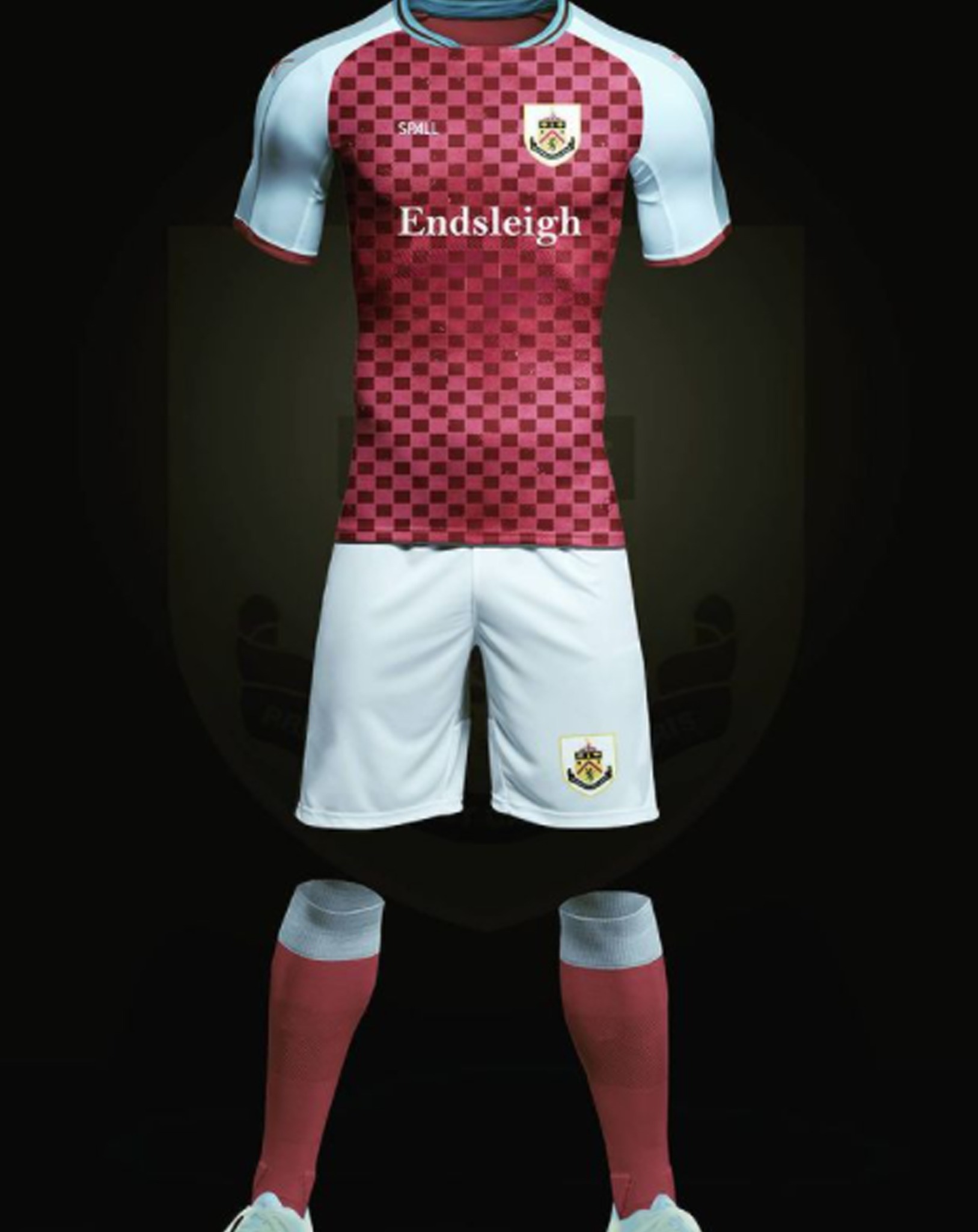 Wizualizacja kompletu sportowego: koszulka w bordowo-różową szachownicę z białymi rękawami i napisem 'Endsleigh', białe spodenki i bordowe getry, wszystko na ciemnym tle.