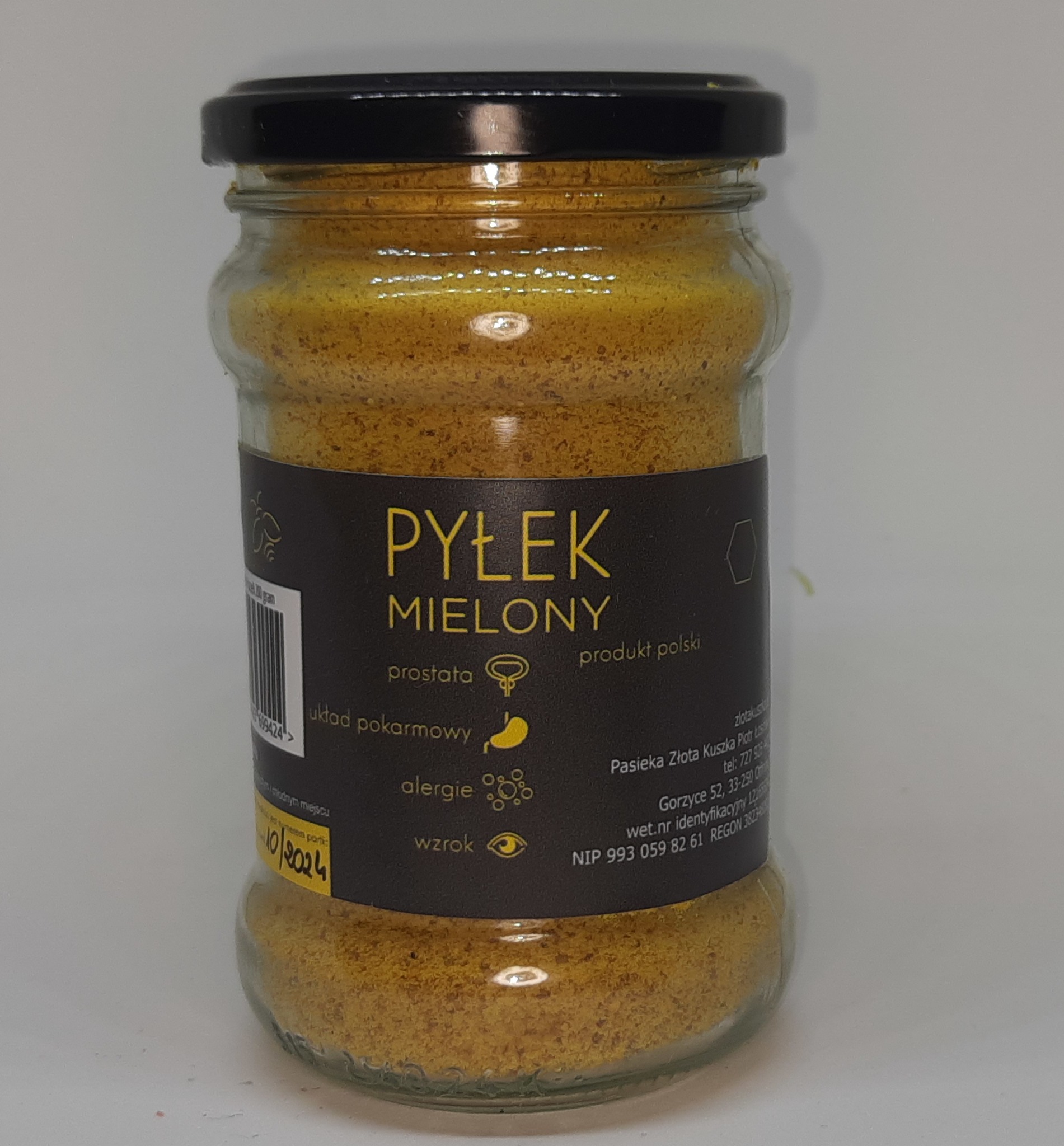 Słoik z pyłkiem mielonym, etykieta z informacjami o produkcie i pasiece, widoczny termin ważności 10/2024.