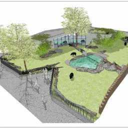 Wizualizacja 3D projektowanego wybiegu dla zwierząt z zielonym dachem budynku w tle, drzewami, zbiornikiem wodnym i ścieżką dla zwiedzających.