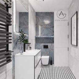 STYLOVE WNĘTRZA - Nowoczesna łazienka z marmurowymi płytkami, białą szafką umywalkową, czarną armaturą i grzejnikiem drabinkowym. Na ścianie logo firmy 'Stylove Wnętrza' i minimalistyczny obrazek w czarnej ramie.