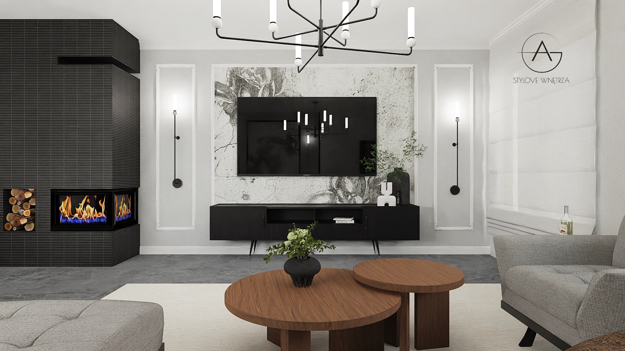Wnętrze salonu z nowoczesnym kominkiem obłożonym czarną, poziomą ceramiką, drewnem ułożonym obok paleniska, czarną szafką RTV pod telewizorem na tle ściany z motywem roślinnym, okrągłymi stolikami...