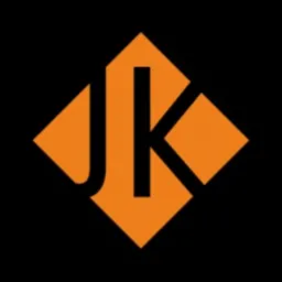 Pomarańczowy logotyp JK w kształcie rombu na czarnym tle.