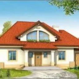 Dwukondygnacyjny dom z czerwonym dachem i jasną elewacją, otoczony zielenią. Widoczne elementy dekoracyjne nad oknami i wejściem, symetryczny układ architektoniczny.