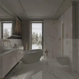 Elegancka łazienka z marmurowymi płytkami, wolnostojącą wanną, podwójną umywalką z szafką, złotą armaturą i widokiem na zimowy krajobraz za oknem.