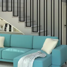 Turkusowa sofa z szezlongiem i jasnymi poduszkami w nowoczesnym salonie, pod schodami zabudowana półka na książki, okrągły stolik kawowy, obraz na ścianie.