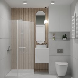 ML Interior - Nowoczesna łazienka z kabiną prysznicową typu walk-in, umywalką nablatową na szafce, owalnym lustrem z podświetleniem i drewnianą okładziną ścienną z lamelami.