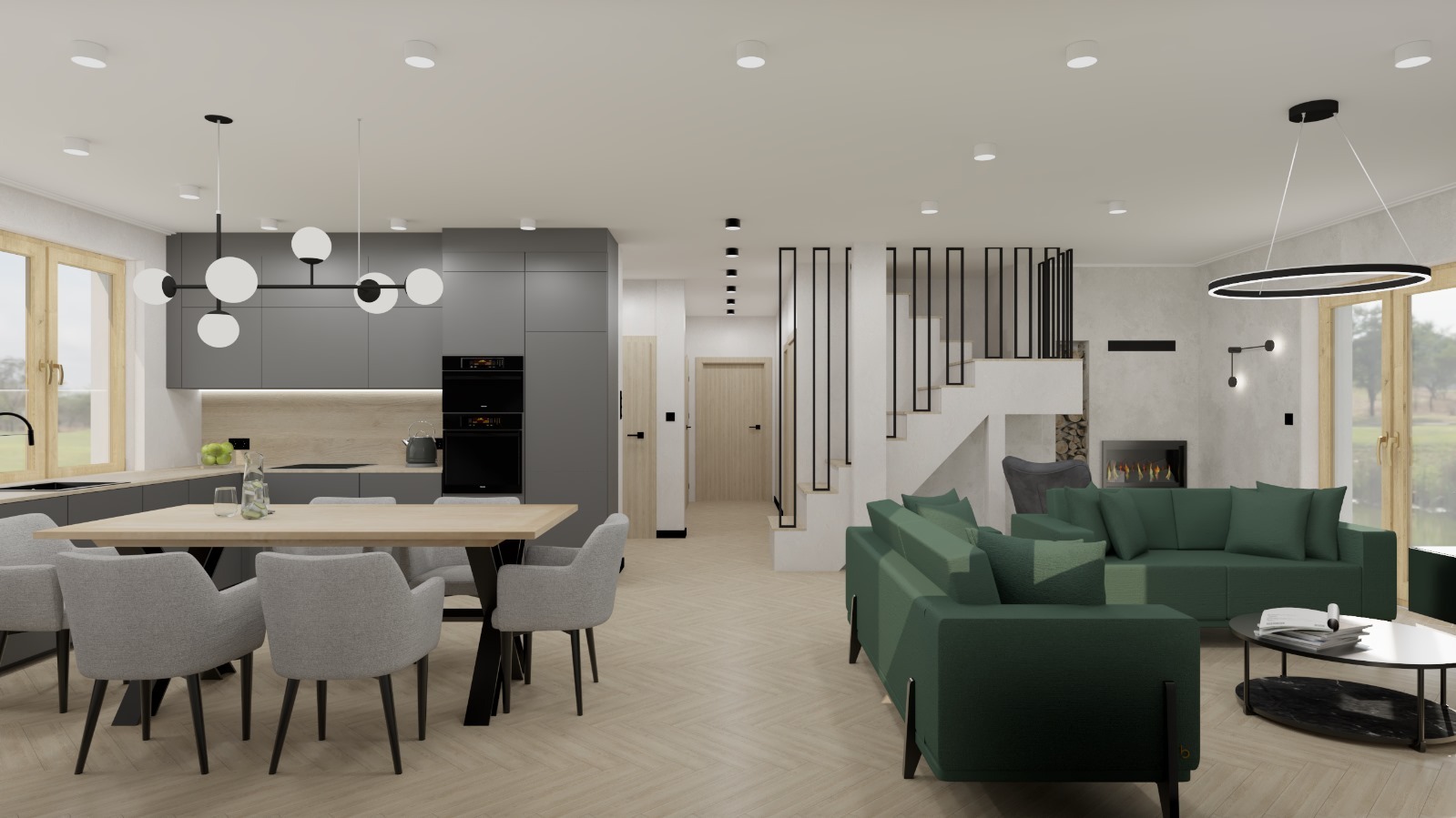 Wizualizacja przestronnego wnętrza domu z otwartą kuchnią, jadalnią i salonem. Szara zabudowa kuchenna z drewnianym blatem, stół z szarymi krzesłami, zielona sofa i kominek. Schody...
