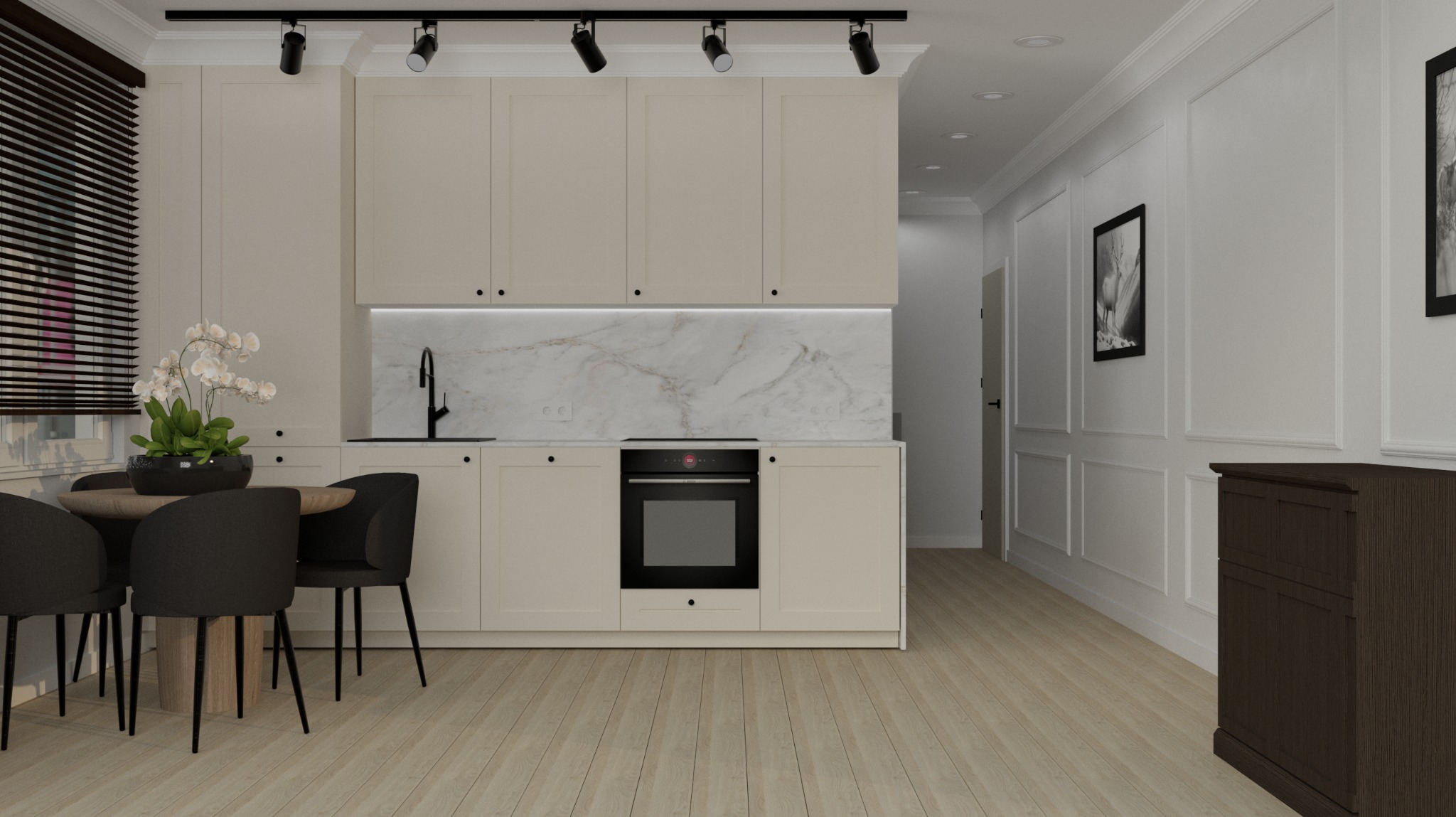 Jasna kuchnia w Gdańsku z marmurowym backsplashiem, czarną armaturą i okrągłym stołem jadalnym z czarnymi krzesłami, oświetlona reflektorami szynowymi.
