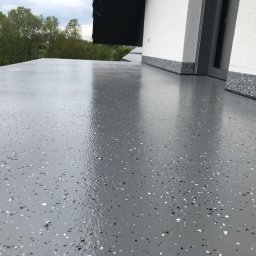 System firmy”STO”
Kolor ral-7037+czipsy (czarno-białe)