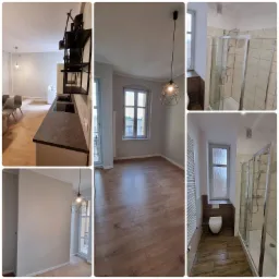 Mozaika zdjęć przedstawiająca wykończone wnętrza: kuchnia z szarą zabudową i czarnym regałem, pokój z drewnianą podłogą i geometryczną lampą, oraz łazienka z kabiną prysznicową i drewnianymi...