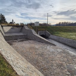 Firma handlowo usługowa Aurelia Kalus - Wykonanie prac związanych z fugowaniem wraz z iniekcją ciśnieniową zbiornika przeciwpowodziowego.