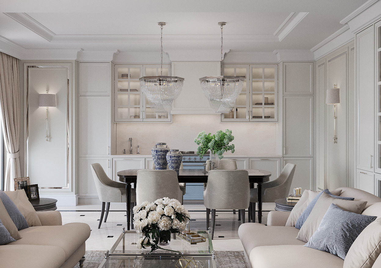 Eleganckie wnętrze: salon z jadalnią i aneksem kuchennym w jasnych barwach, kryształowe żyrandole, marmurowa podłoga, sofa z poduszkami i kwiaty na szklanym stoliku kawowym.