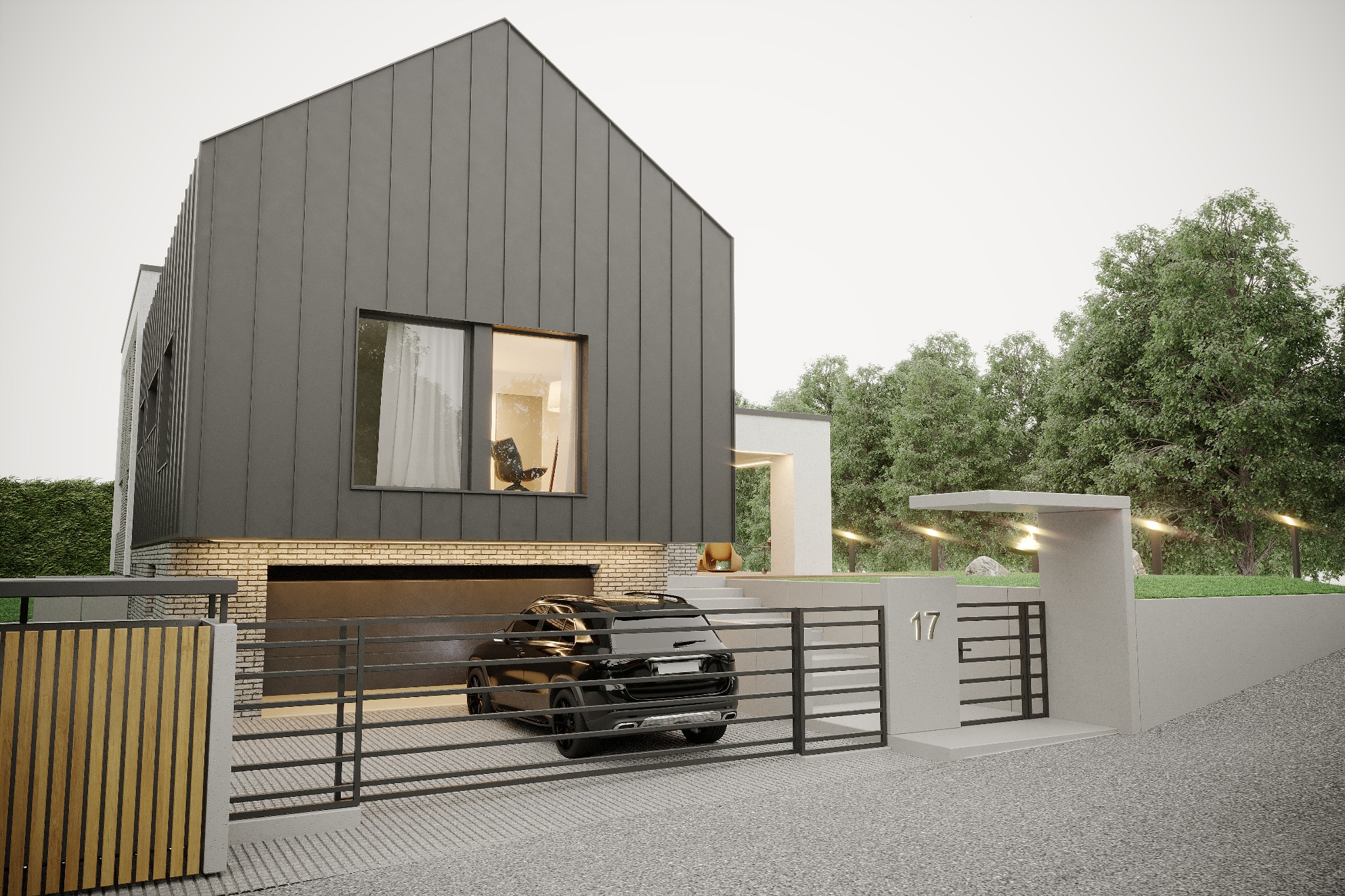 Nowoczesny dom jednorodzinny z ciemną elewacją, garażem w bryle budynku i czarnym samochodem parkującym na podjeździe, widok zza metalowej bramy z numerem 17.