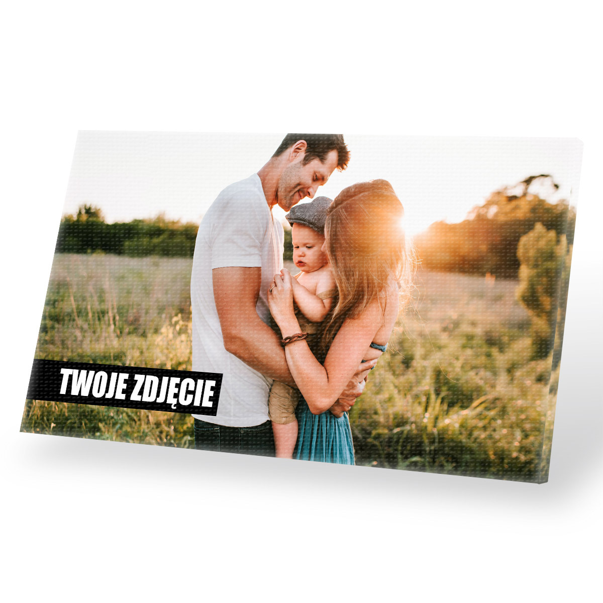 Zdjęcie rodzinne wydrukowane na płótnie, ustawione pod kątem na białym tle, z widocznym napisem 'TWOJE ZDJĘCIE'.