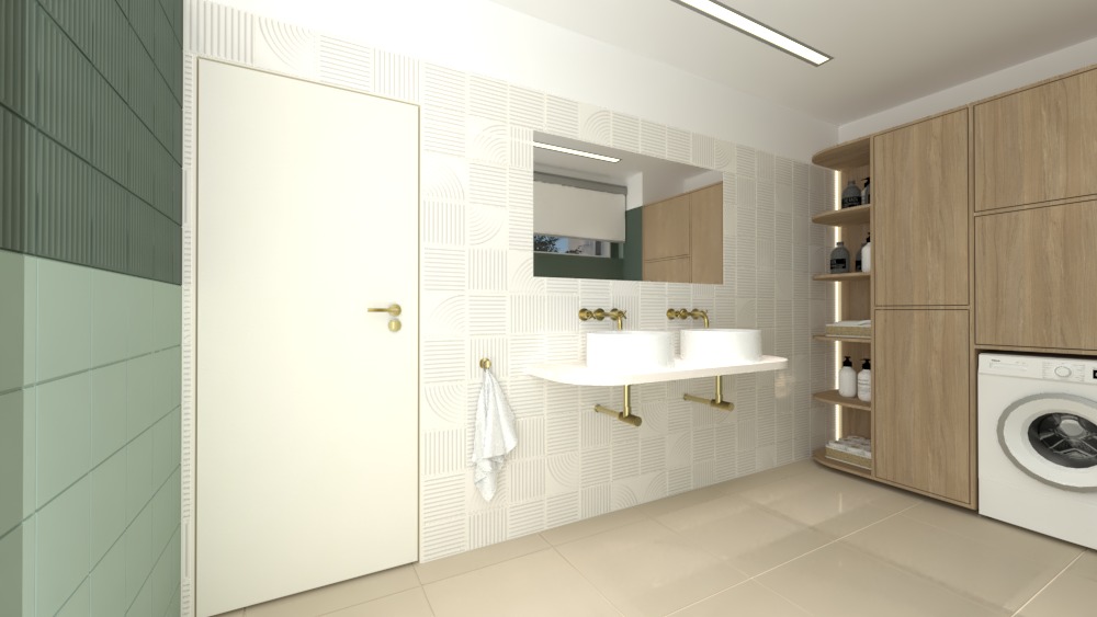 Jasna łazienka z umywalką nablatową, złotą armaturą, pralką w zabudowie i płytkami z geometrycznym wzorem.