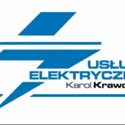 Niebieskie logo firmy świadczącej usługi elektryczne, z nazwą 'Usługi Elektryczne Karol Krawczyk' i symbolem błyskawicy.