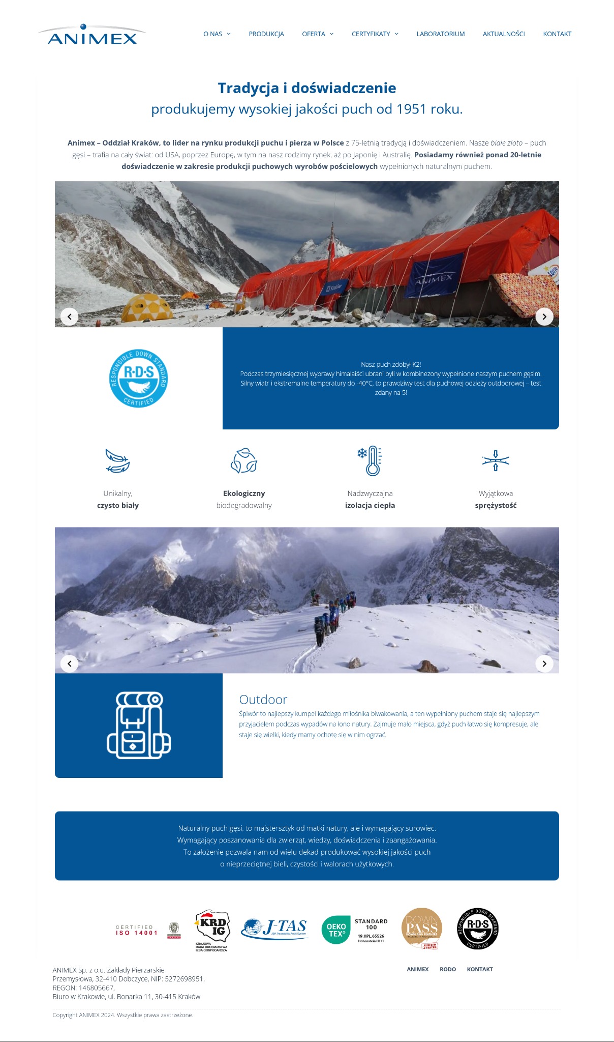 Zdjęcie przedstawia duży, czerwony namiot ekspedycyjny z logo Animex rozstawiony na tle ośnieżonych gór. W oddali widoczne mniejsze, żółte namioty. Namiot sugeruje ekstremalne warunki pogodowe...