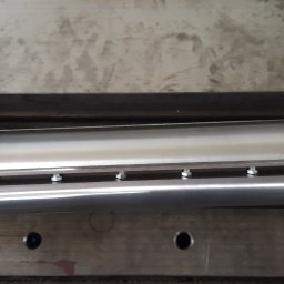 Ślusarski Zakład Produkcyjno-Handlowy Tadeusz Jarończyk - wykonanie wałka nożowego do grubościówko-wyrówniarki wraz z kołem pasowym i oprawami