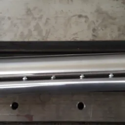 wykonanie wałka nożowego do grubościówko-wyrówniarki wraz z kołem pasowym i oprawami