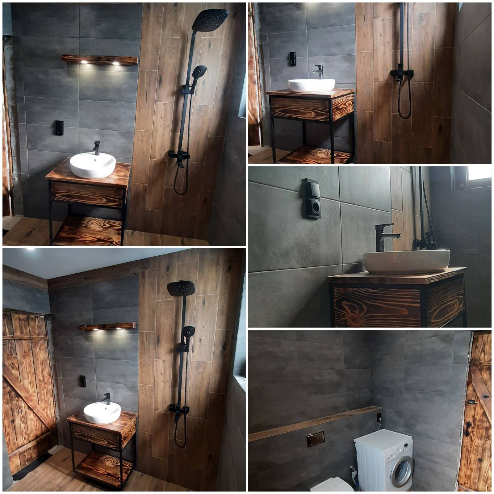 Nowoczesna łazienka z szarymi płytkami, drewnianymi akcentami, umywalką nablatową na drewnianej szafce z metalowymi nogami, czarną armaturą i drewnianymi drzwiami stodołowymi.