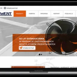Strona internetowa firmy Tywent, producenta wentylator&oacute;w przemysłowych, wyświetlona na ekranie laptopa MacBook Pro. Widoczny numer telefonu, adres e-mail, logo firmy oraz menu nawigacyjne strony.